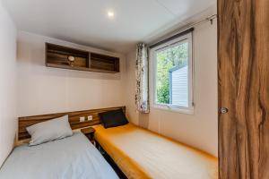Campings Mobil Home Confort Avec Clim 6 : photos des chambres