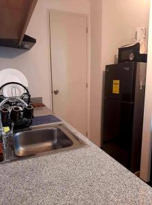 Arezzo Place Davao - Condo Rentals WITH FREE POOL, 200MBPS CONNECTION