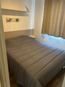 Campings Chez Nathalie mobil home chauffe et climatise : photos des chambres