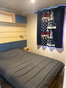 Campings Chez Nathalie mobil home chauffe et climatise : photos des chambres