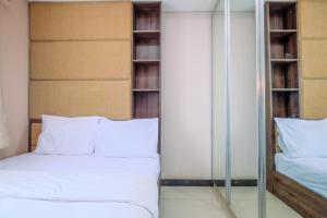 Cozy Stay 1BR at Sky Terrace Apartment By Travelio