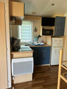 Campings Chez Nathalie mobil home chauffe et climatise : photos des chambres
