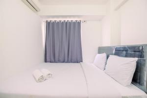 Brand New and Comfort 2BR at Bassura City Apartment By Travelio