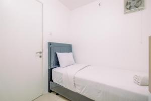 Brand New and Comfort 2BR at Bassura City Apartment By Travelio