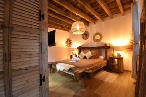 B&B / Chambres d'hotes LE RELAIS DES CALECHES - La Balinaise : photos des chambres