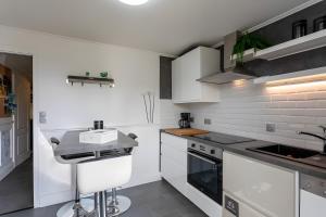 Appartements Rez de jardin & Salle de reunion : photos des chambres