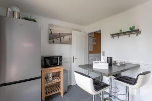 Appartements Rez de jardin & Salle de reunion : photos des chambres