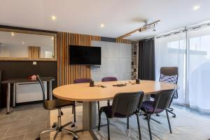 Appartements Rez de jardin & Salle de reunion : photos des chambres