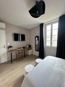 Sejours chez l'habitant KLOOZIA Suites centre ville haut standing : photos des chambres
