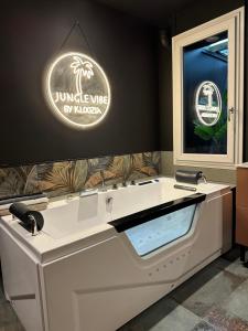 Sejours chez l'habitant KLOOZIA Suites centre ville haut standing : photos des chambres