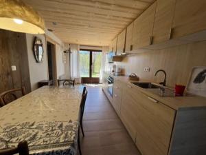 Chalets Charmant Chalet Hiona : photos des chambres