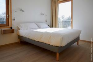 Appart'hotels La Ferme Des Ailleurs : photos des chambres