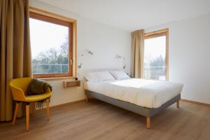 Appart'hotels La Ferme Des Ailleurs : photos des chambres
