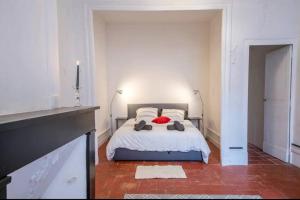 Appartements Le rouge, coeur de ville : photos des chambres