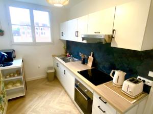 Appartements Le Cocon De La Tour -VIP-Compiegne-Hyper Centre : photos des chambres
