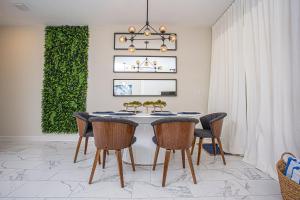 4Q3B Casa luxuosa no Champions Gate Resort