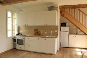 Appartements La Pouliniere : photos des chambres