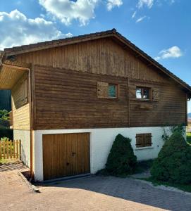 Chalets Chalet du Pre - Sauna, terrasse et grand jardin : photos des chambres