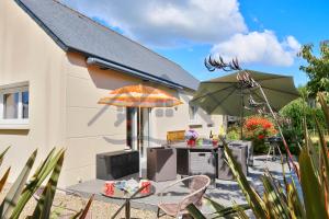 Maisons de vacances LocaLise - M8B - Ty Katell-Roz - Maison de plain-pied avec un terrain entierement clos a quelques pas de la plage et du centre - Wifi inclus - Draps inclus - Animaux bienvenus : photos des chambres