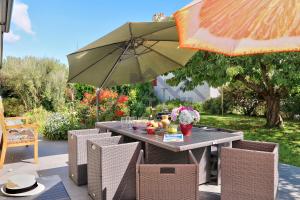 Maisons de vacances LocaLise - M8B - Ty Katell-Roz - Maison de plain-pied avec un terrain entierement clos a quelques pas de la plage et du centre - Wifi inclus - Draps inclus - Animaux bienvenus : photos des chambres