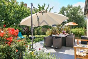 Maisons de vacances LocaLise - M8B - Ty Katell-Roz - Maison de plain-pied avec un terrain entierement clos a quelques pas de la plage et du centre - Wifi inclus - Draps inclus - Animaux bienvenus : photos des chambres