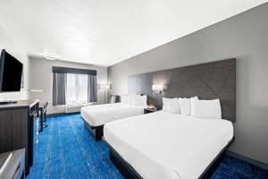 Queen Room with Two Queen Beds room in Best Western Palace Inn & Suites