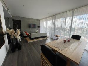 Espectacular diseño, terraza con Hamaca y Jacuzzi