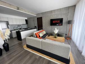 Espectacular diseño, terraza con Hamaca y Jacuzzi