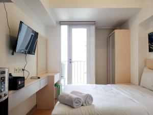 Minimalist and Comfortable Studio Apartment Tokyo Riverside PIK 2 By Travelio