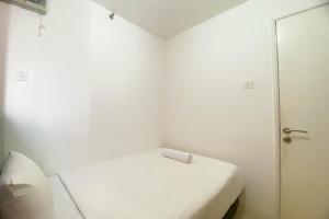 Comfort and Homey 3BR Bassura City Apartment By Travelio