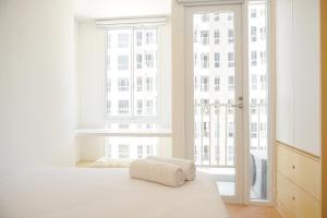 Cozy Living and Warm Studio at Tokyo Riverside PIK 2 Apartment By Travelio