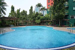 Spacious and Homey 2BR at Nuasa Hijau Pondok Indah Apartment By Travelio