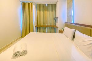 Best Location 2BR Apartment at Capitol Park Residence By Travelio