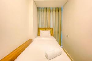 Best Location 2BR Apartment at Capitol Park Residence By Travelio