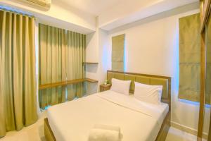 Best Location 2BR Apartment at Capitol Park Residence By Travelio