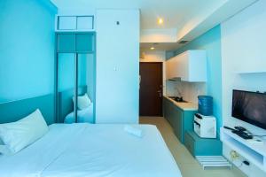 Nice and Strategic Studio Apartment at Capitol Park Residence By Travelio