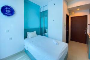 Nice and Strategic Studio Apartment at Capitol Park Residence By Travelio