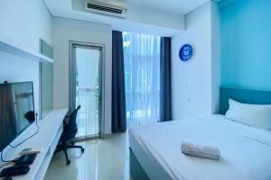 Nice and Strategic Studio Apartment at Capitol Park Residence By Travelio