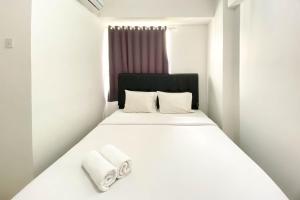 Full Furnished and Homey 2BR Bassura City Apartment near Mall By Travelio