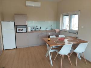 Tópart Apartmanok