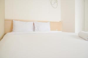 Best Deal and Modern 2BR Bassura City Apartment By Travelio