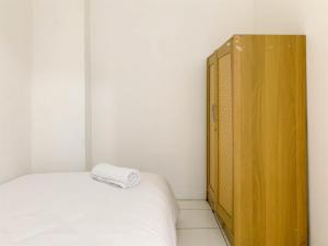 Cozy 2BR at Delta Cakung Apartment By Travelio