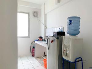 Cozy 2BR at Delta Cakung Apartment By Travelio