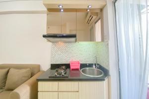 Good Deal and Minimalist 2BR at Bassura City Apartment By Travelio