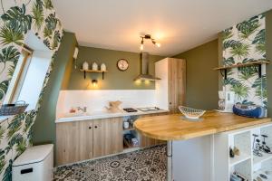Appartements Magnolia Bleu - Appt 61 m2 pour 4 avec parking : photos des chambres