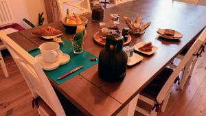 Sejours chez l'habitant Chambre avec terrasse - vue jardin : photos des chambres