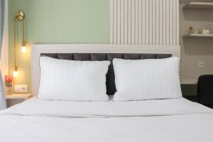 Cozy Stay and Minimalist 1BR Tokyo Riverside PIK 2 Apartment By Travelio