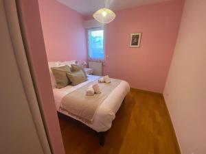 Appartements Au Bonheur des Roses, parking, terrasse & jardin : photos des chambres