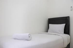 Cozy Stay 3BR Bassura City Apartment near Mall By Travelio