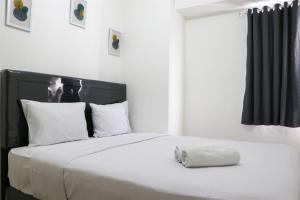 Cozy Stay 3BR Bassura City Apartment near Mall By Travelio